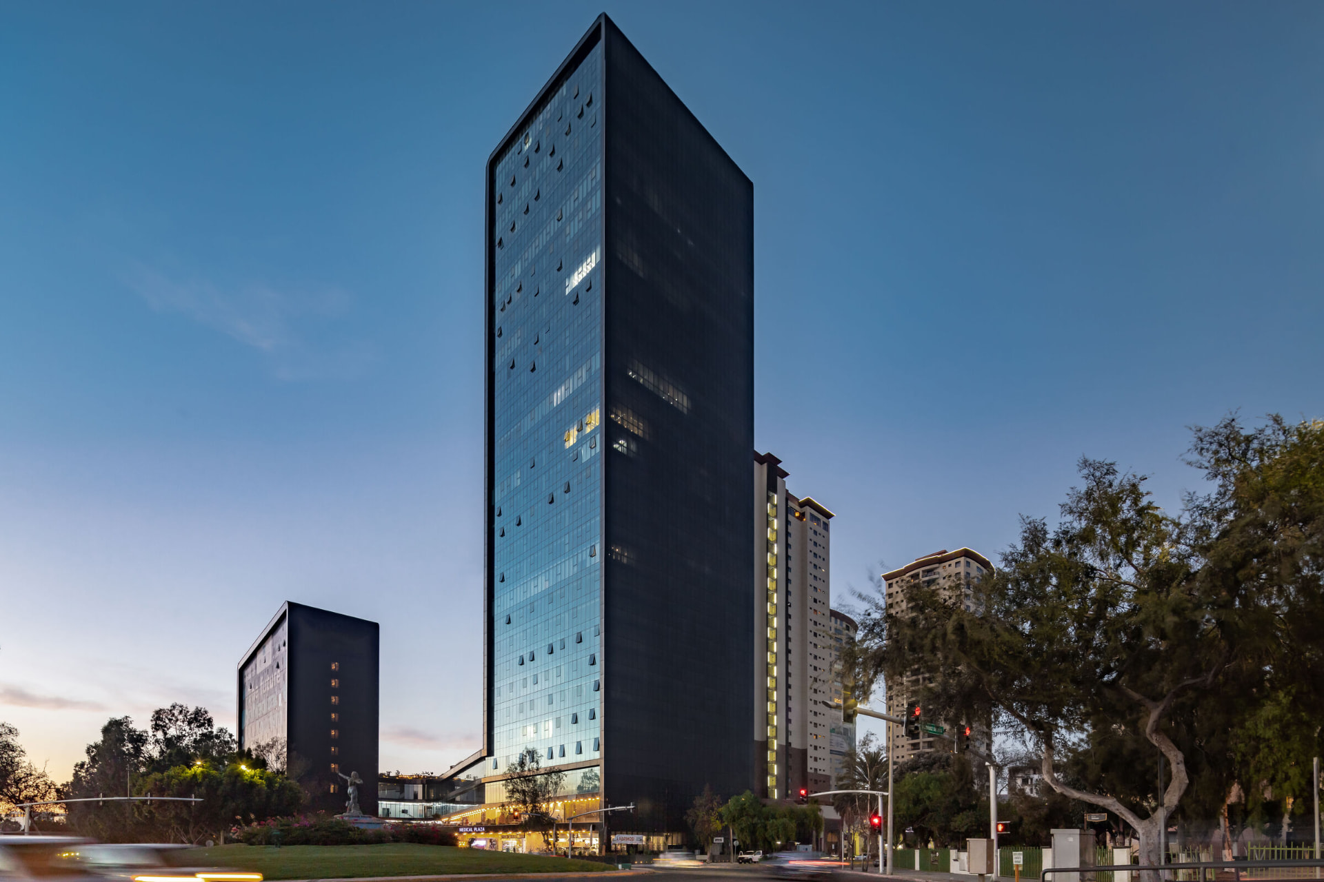 NewCity Medical Plaza tower in Tijuana at dusk